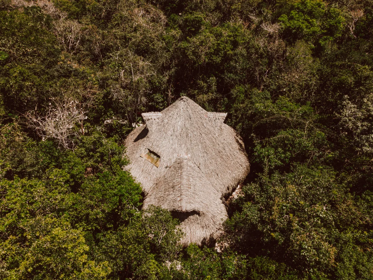 Aerial view of the ceremonial temple and jungle canopy at Casa Arkaana, the Tulum jungle wedding venue